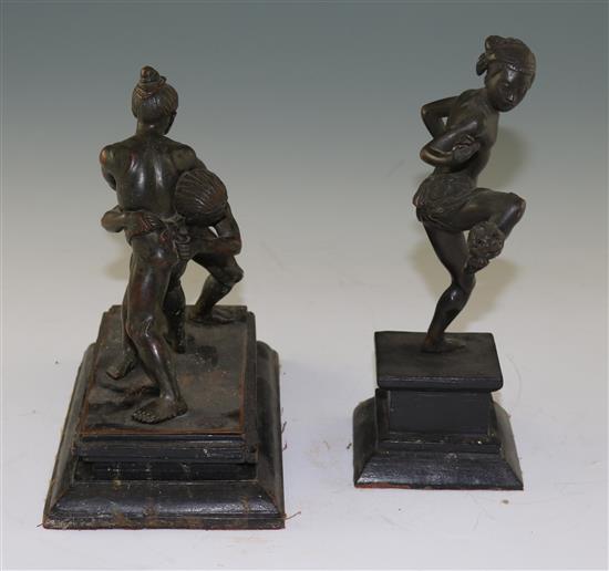 A Burmese bronze group of wrestlers and another of Chinlone player, early 20th century, 20cm & 21.5cm (7.9in. & 8.5in.)